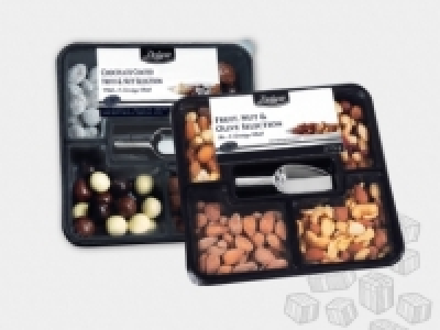 Luxus Schokolade, Nuss- und Fruchtmischung mit Schaufel