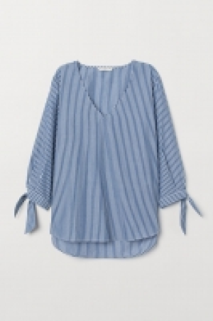  Bluse mit V-Ausschnitt CHF 10.95