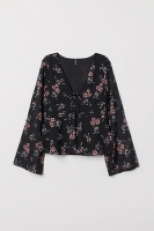  Bluse mit V-Ausschnitt CHF 9.95