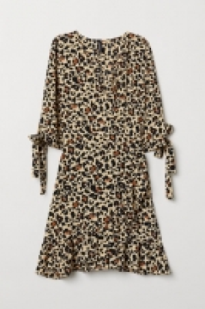  Gemustertes Wickelkleid CHF 23.95