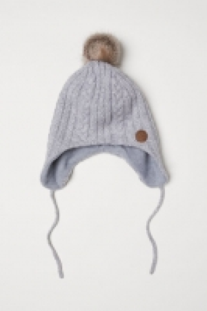  Mütze in Zopfstrick CHF 8.95