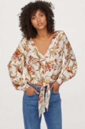  Gemusterte Bindebluse CHF 12.95