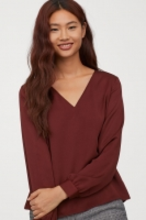  Bluse mit V-Ausschnitt CHF 20.95
