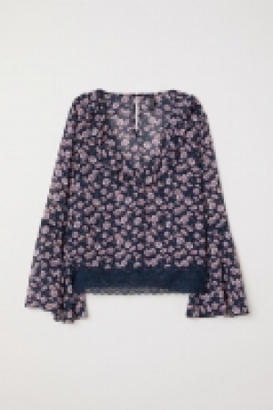 Bluse mit V-Ausschnitt CHF 27.95