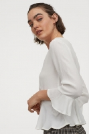 V-Bluse mit Knöpfen CHF 14.95