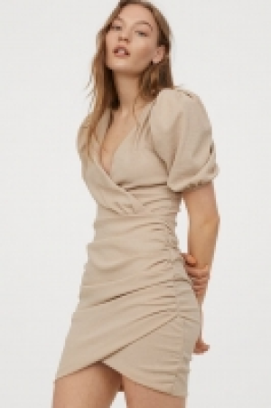 Wickelkleid mit Puffärmeln CHF 22.95