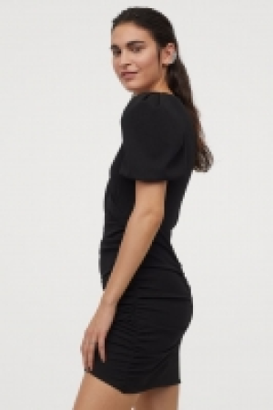 Wickelkleid mit Puffärmeln CHF 30.95