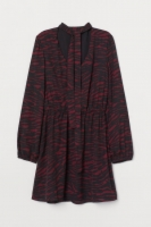 Kleid mit Bindebändern CHF 15.95