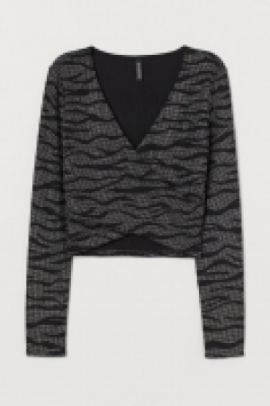 Glitzershirt mit V-Ausschnitt CHF 10.95