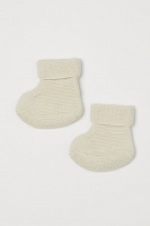 Gestrickte Hausschuhe CHF 7.95