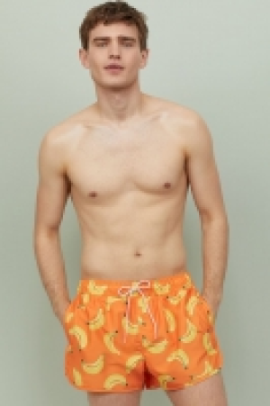 Kurze gemusterte Badeshorts CHF 14.95