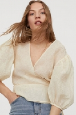 Gecrinkelte Wickelbluse CHF 11.95