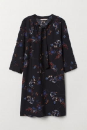 Kleid mit Bindebändern CHF 12.45