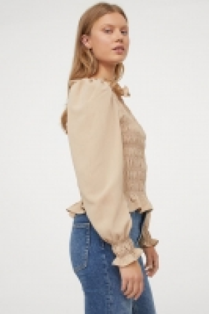 Gesmokte Bluse mit Puffärmeln CHF 9.95