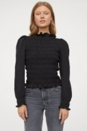 Gesmokte Bluse mit Puffärmeln CHF 14.95