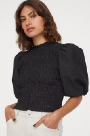 Gesmokte Bluse mit Puffärmeln CHF 7.95