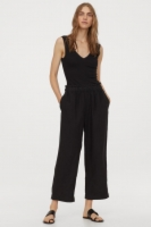 Geripptes Tanktop mit Spitze CHF 4.95