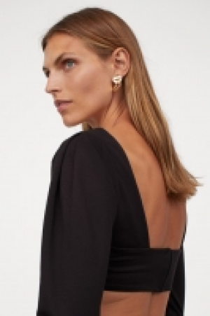 Kurzes Shirt mit Puffärmeln CHF 15.95