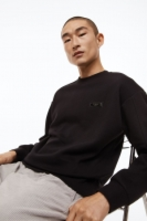 Sweatshirt mit Applikation Relaxed Fit CHF 24.95