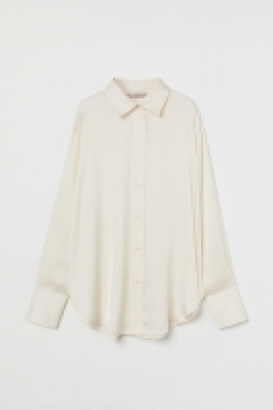 Glänzende Bluse CHF 18.95