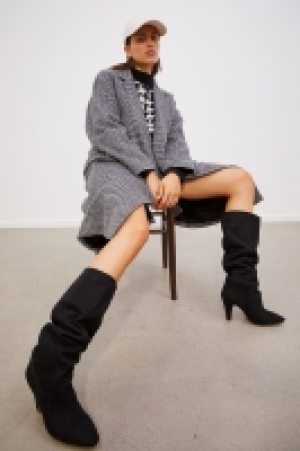 Kniehohe Stiefel mit hohem Absatz CHF 41.95