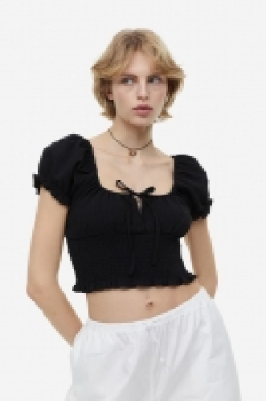 Gesmokte Bluse mit Puffärmeln CHF 6.95