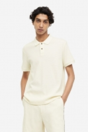Poloshirt mit Waffelmuster in Slim Fit CHF 25.95