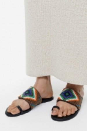 Pantoletten mit Zehenschlaufe CHF 24.95