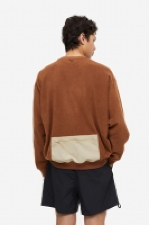 Fleece-Sweatshirt mit Tasche CHF 14.95