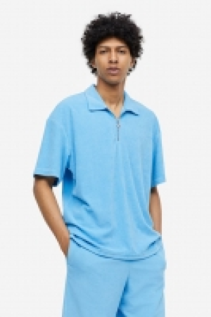 Poloshirt aus Frottee in Relaxed Fit CHF 22.95