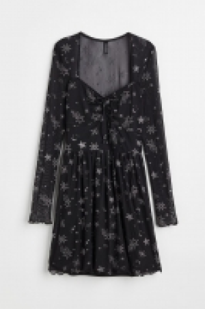 Glitzerndes Meshkleid