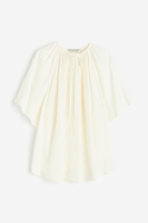 Bluse in Oversize-Passform