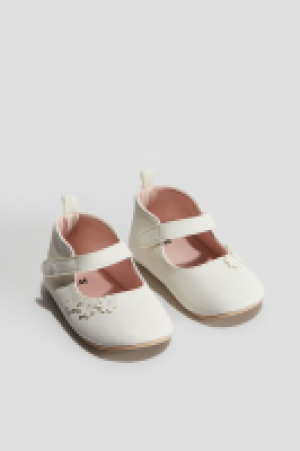 Ballerinas mit Blumendetail